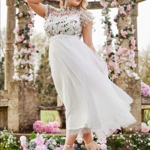 Brand new size 18 white and embroidered dress.